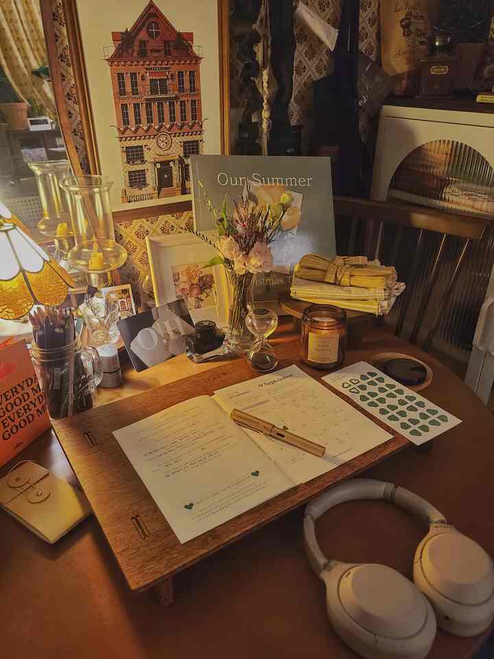 Warm wood-toned vintage study featuring a desk with fountain pen and notebook, illuminated by cozy lighting