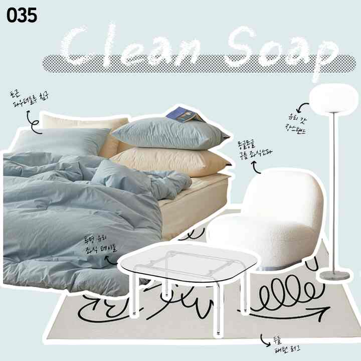 ホワイトとパウダーブルーのトーンの寝室、透明なガラステーブルと雲のような座椅子が配置されたモダンで居心地の良いインテリア