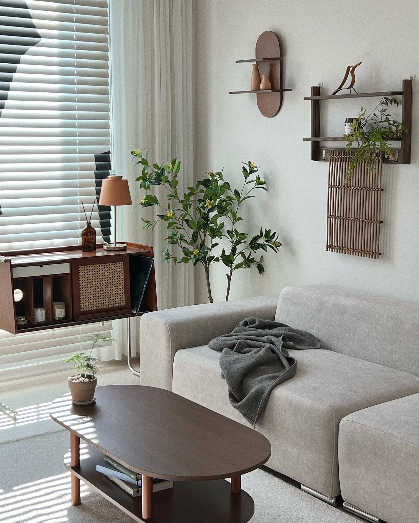 Walnut Oval Coffee Table with Storage Shelf user photo