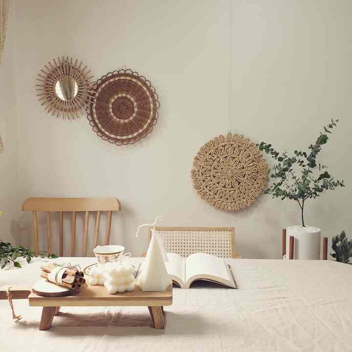 Cozy home cafe dining space featuring natural wood tones and linen tablecloth