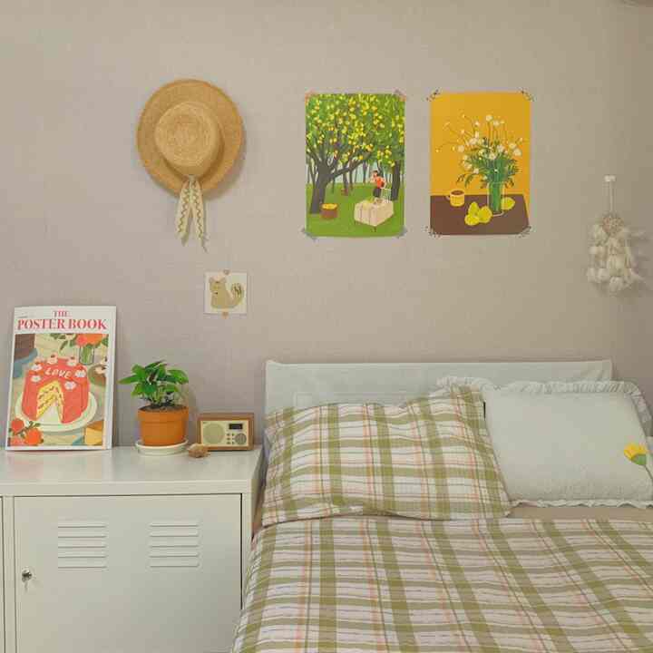 Natural-toned bedroom featuring a white metal cabinet and plaid bedding creating a cozy atmosphere