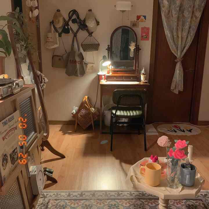 Cozy small room with warm wood tones and natural vibe, featuring a vanity and full-length mirror.