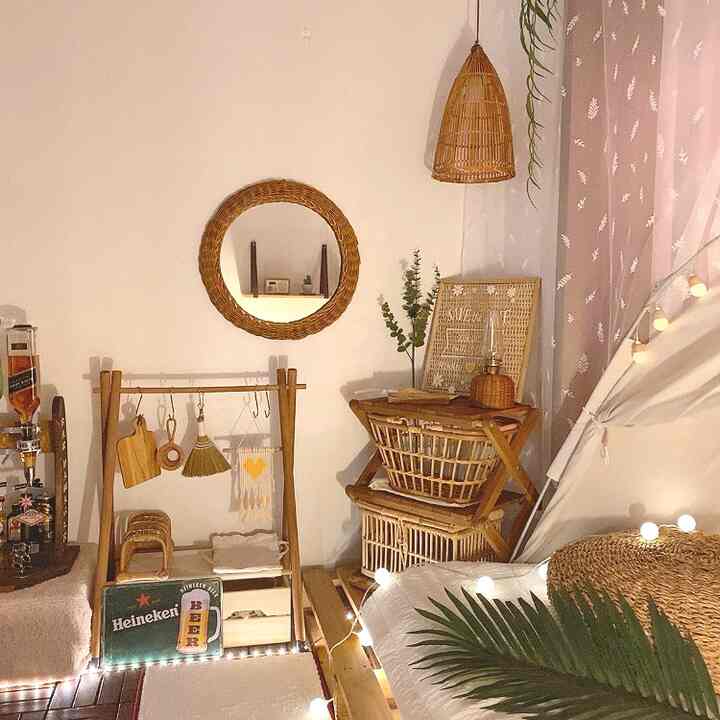 Cozy small room interior featuring natural wood tones and home bar-style decor elements