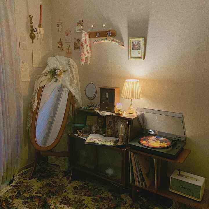 Warmly lit vintage-style veranda home cafe featuring a full-length mirror and LP turntable, creating a cozy atmosphere