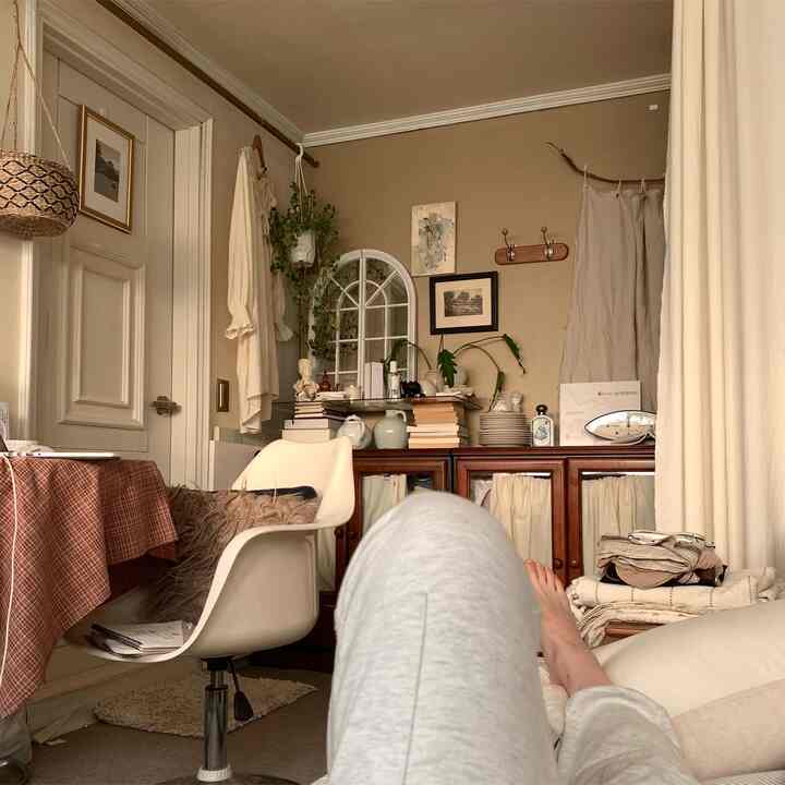 Beige-toned living room featuring natural furniture and cozy setup for comfortable reading and relaxation