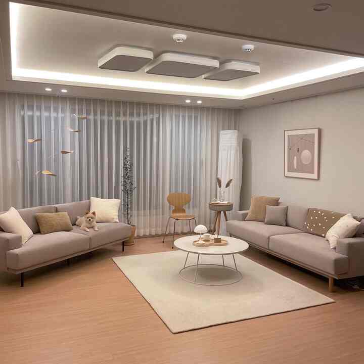 Natural tone living room with wooden floor and beige sofas, simple and cozy atmosphere