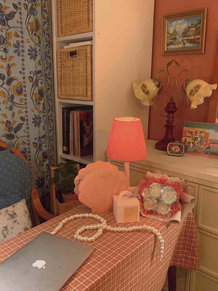 Cozy space with warm retro tones featuring a desk and vintage lighting