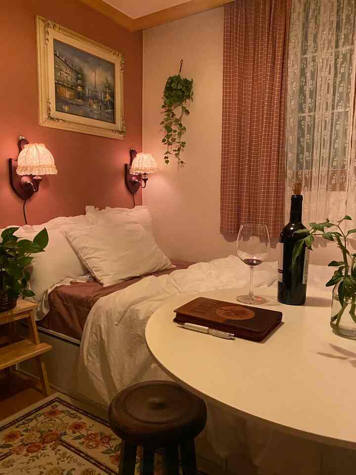 Cozy vintage bedroom in warm brown and white tones, featuring lace wall sconces and a round dining table