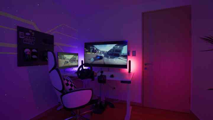 ホワイト家具とブラウンの木製床が調和する、シンプルで印象的なゲームルーム