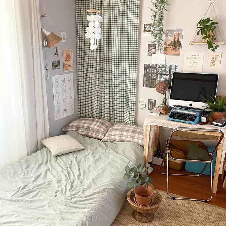 Natural style bedroom and home office with green check curtains and bedding