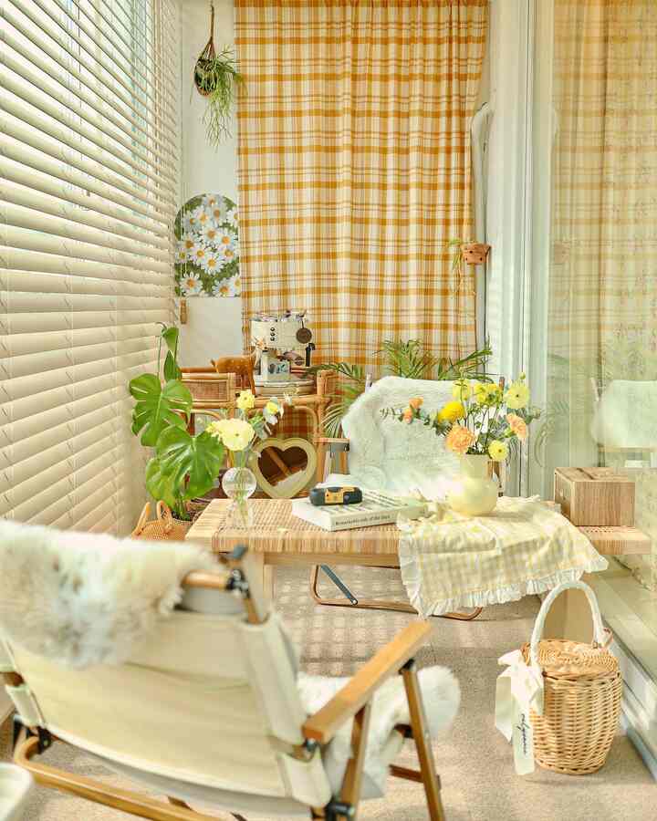 Natural tone veranda home cafe featuring yellow plaid curtains and rattan furniture with cozy atmosphere