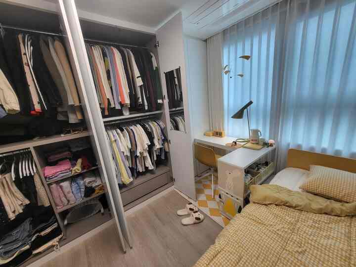 Natural beige and yellow tone 6-tatami bedroom featuring bed and desk setup in cozy single household space