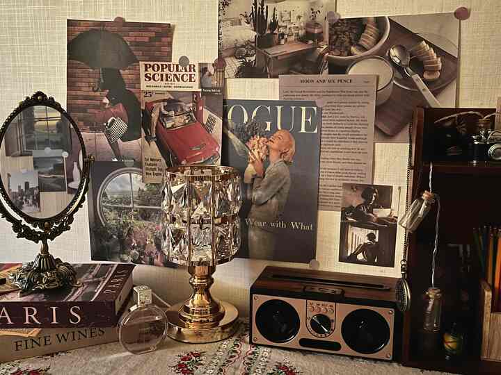 Vintage gold decorations and retro-style accessories arranged on a wall display space