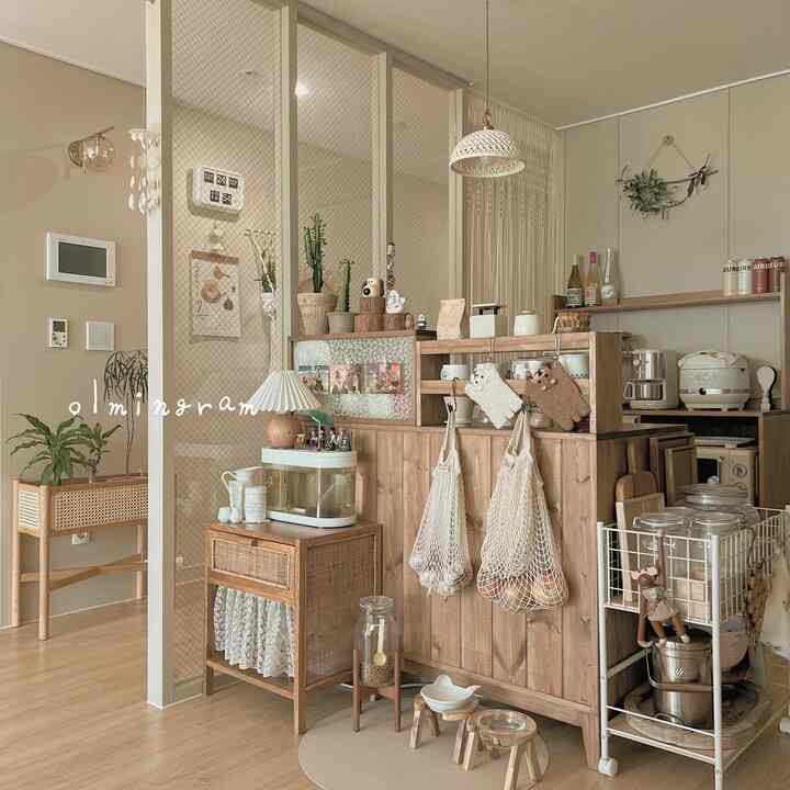 Beige and wood tone kitchen featuring wood furniture and home cafe setup with a natural, warm atmosphere