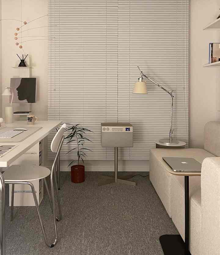 A modern and simple study space in white and gray tones featuring a white desk, sofa, Geneva speaker, and blinds