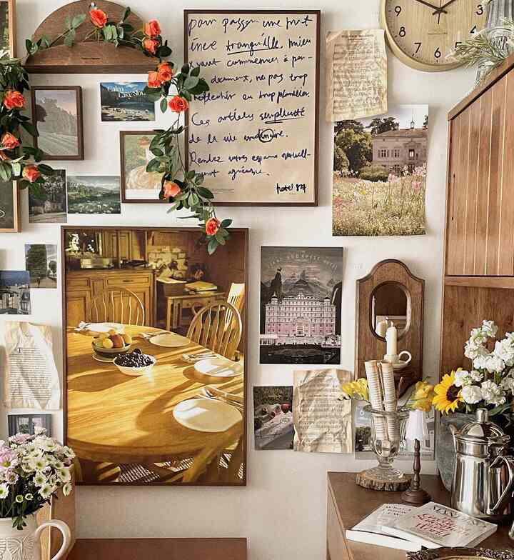 Warm wood tones and vintage wall decor create a cozy dining room atmosphere