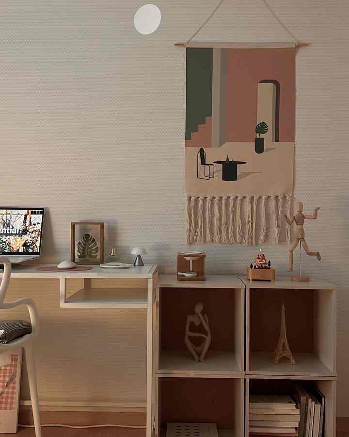 Natural color and white tone study space featuring a simple desk and wooden objets, creating a calm interior