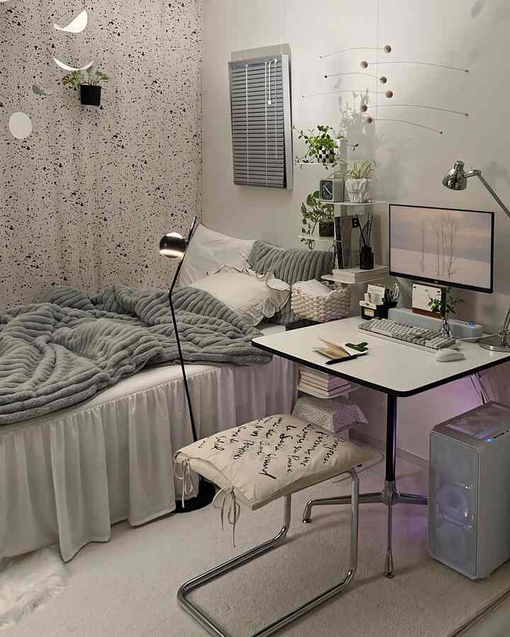 White and gray toned 6-tatami studio bedroom featuring desk and computer setup with cozy home office atmosphere