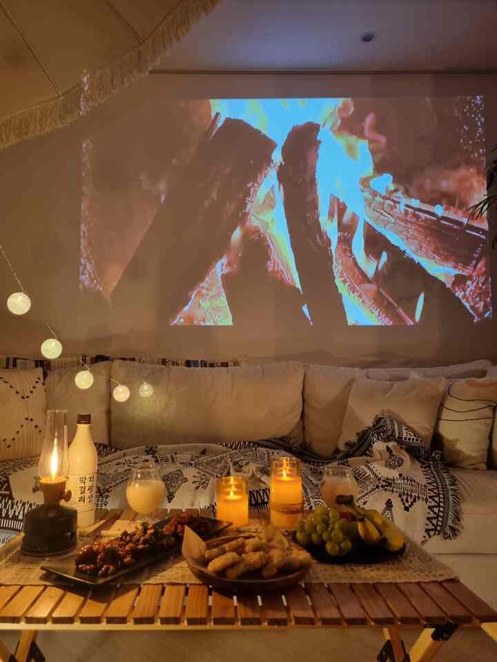 2-3. Camping at home! Part 2!! 🔥

I uploaded the first part of the daytime home camping photos, but this time I'll enjoy the night version^^

What's for the night? It's a fire pit~🔥

Actually, these days, small fire pit lamps are good, and if you look closely at the lanterns that are lit with kerosene gas, the flames are pretty~

However, it's a little dangerous indoors, and you need to ventilate them to burn them, so I'll play a video with the sound of firewood crackling with a beam!!

If you project it on the wall with a large screen and connect a speaker, the atmosphere is pretty good~ㅎ

The LG CineBeam is useful for camping and watching movies at home!

It is well organized with a portable pouch, so it is good to carry around when camping, and the image quality is good, so it is one of the camping items that I think I bought well^^ #거실인테리어 #홈스타일링 #홈캠핑 #불멍 #캠핑 #오라이프추천 #오라이프 #취미 #집꾸미기 #소품 #캠핑용품 #감성템