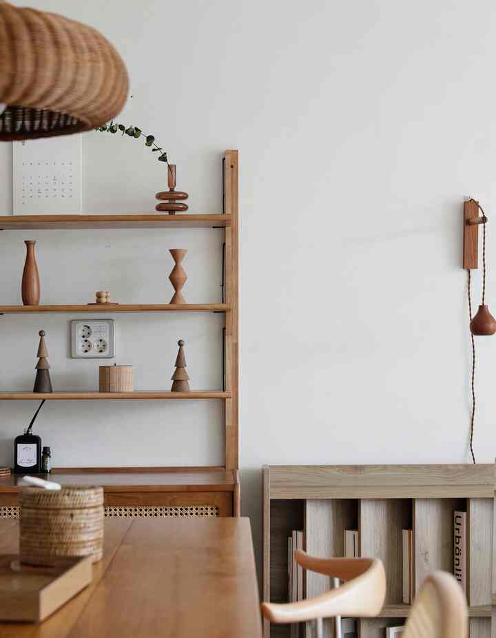 Cozy living space featuring wood tone and natural wooden furniture with simple design