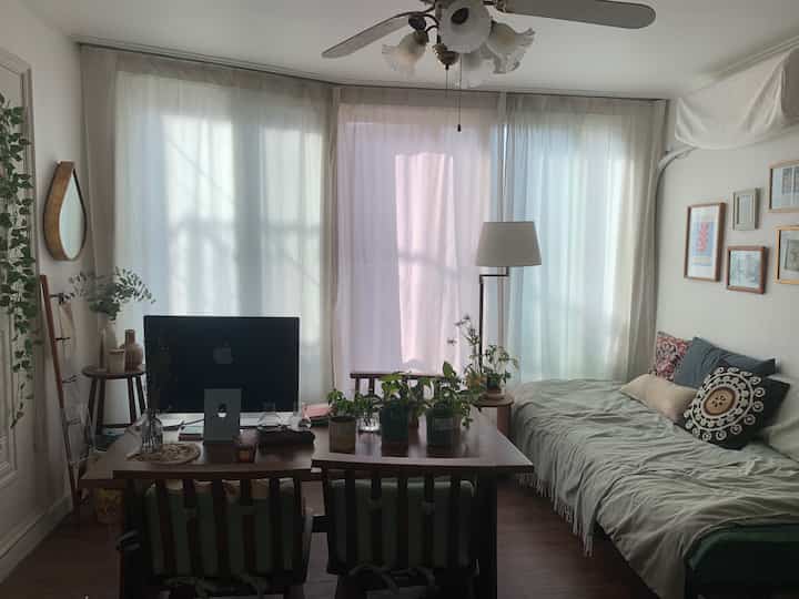 Natural modern 6-tatami room featuring white walls, wood tone furniture, home office, and bedroom elements