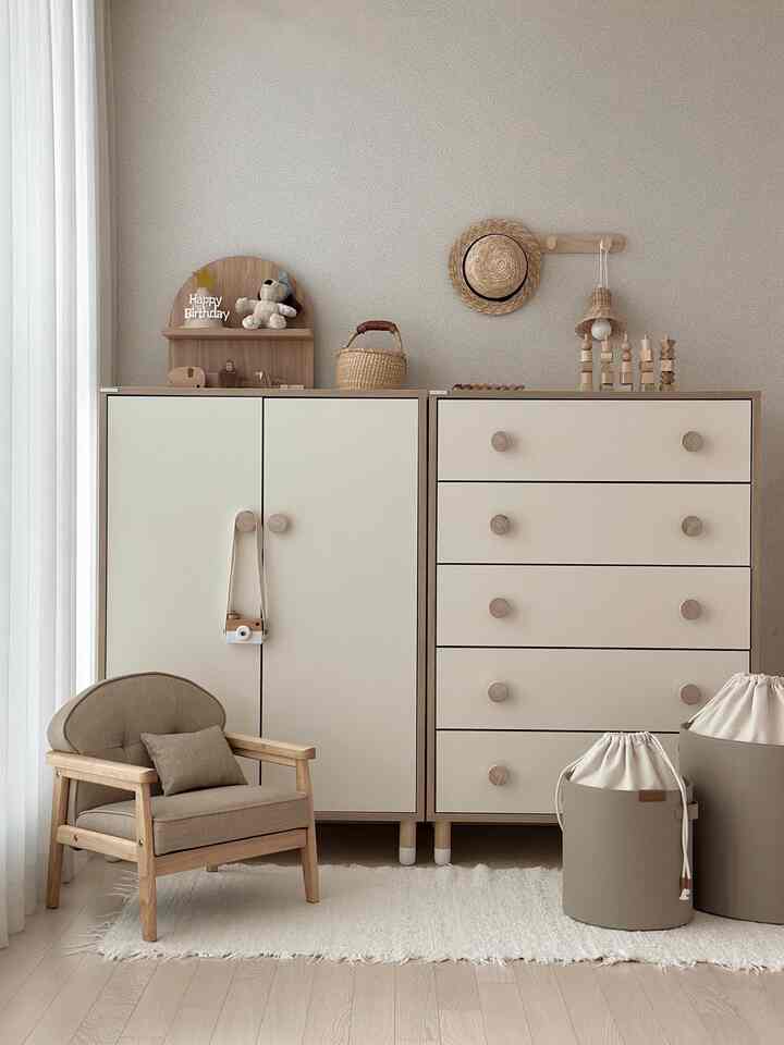 Natural-toned kids' room featuring Tori baby wardrobe set and infant furniture in a warm, organized space