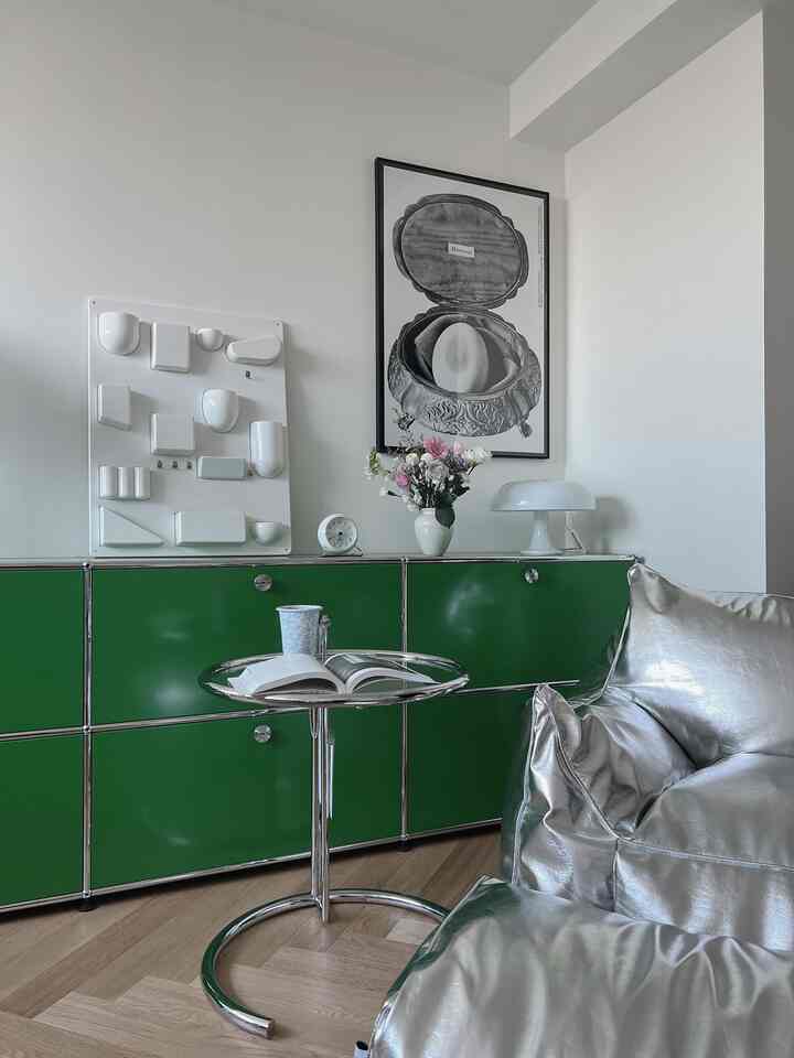 Natural modern living room with green cabinet and silver bean bag sofa, featuring simple and clean atmosphere