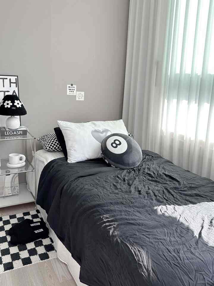 Monotone bedroom with white and black tones, a simple and cozy space for a single household