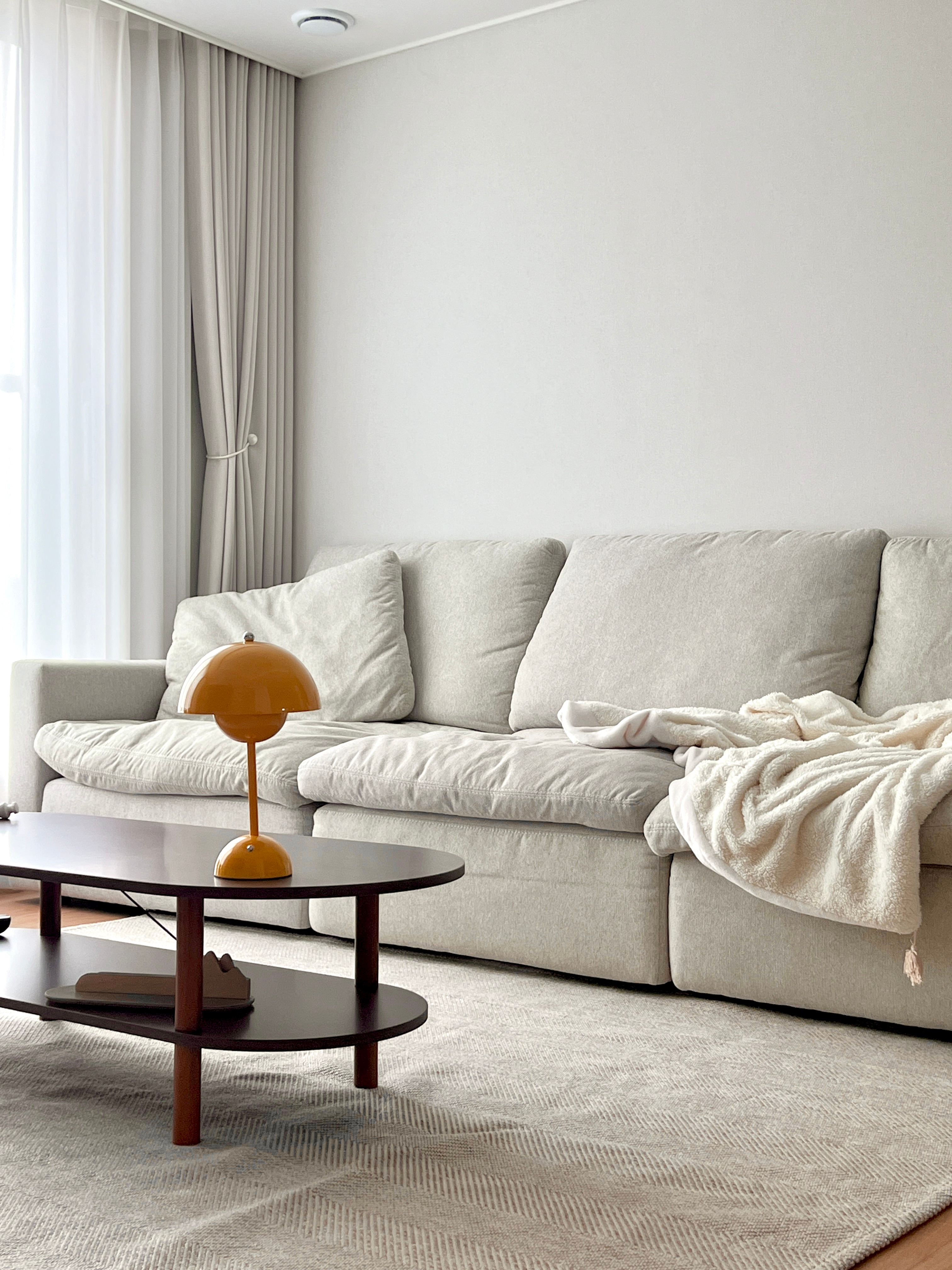 Walnut Oval Coffee Table with Storage Shelf user photo