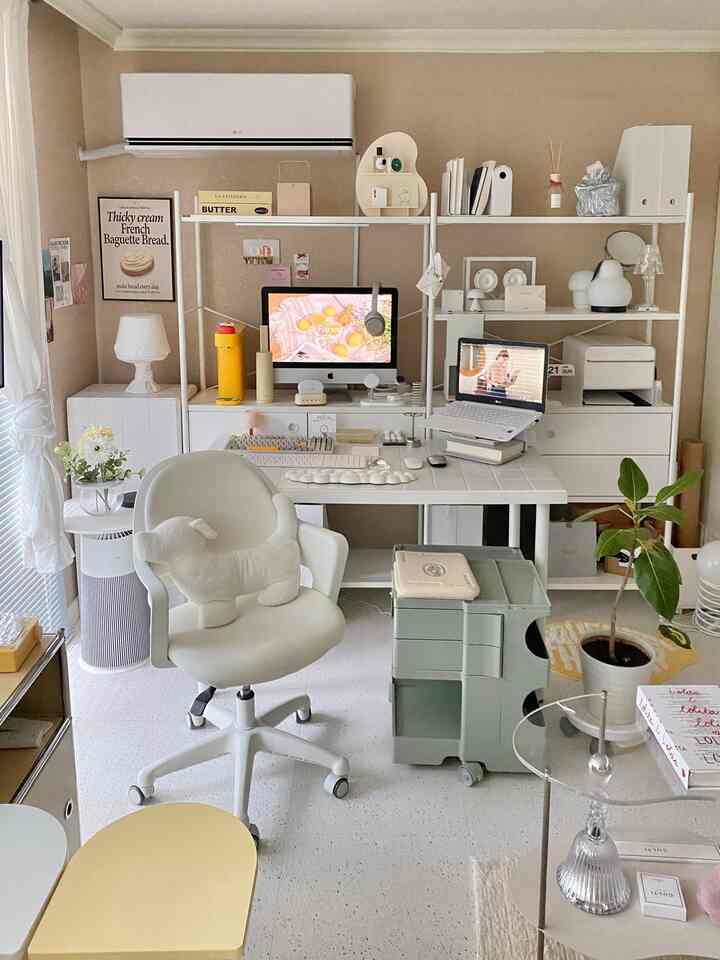 Beige and white toned home office featuring a tidy desk and ergonomic chair creating a cozy workspace