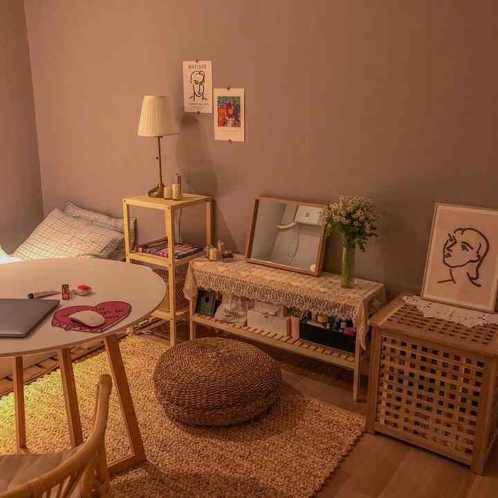 Cozy bedroom in warm natural tones featuring wooden furniture and a rattan rug