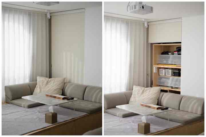 Natural color and wood tone living room featuring a hidden wooden shelf with roll screen and comfortable sofa in a simple setting