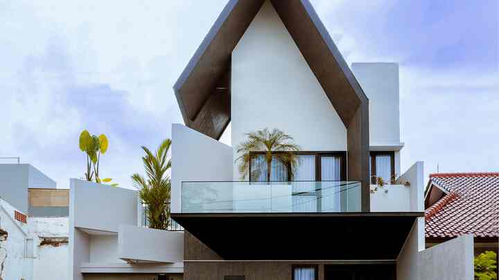 Rumah Tropical dengan Ruang Bukaan Hijau