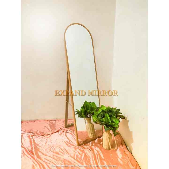 Oval standing mirror