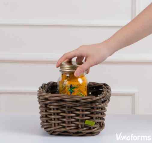 Square basket in palm