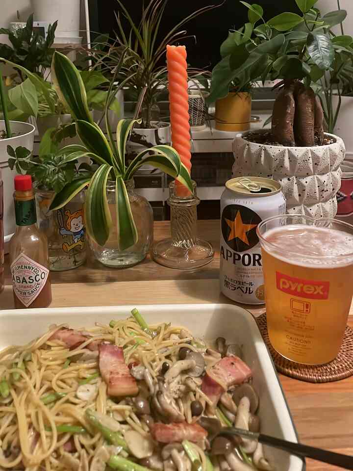 Natural tones table featuring assorted plants with a cozy home bar and home cafe setting