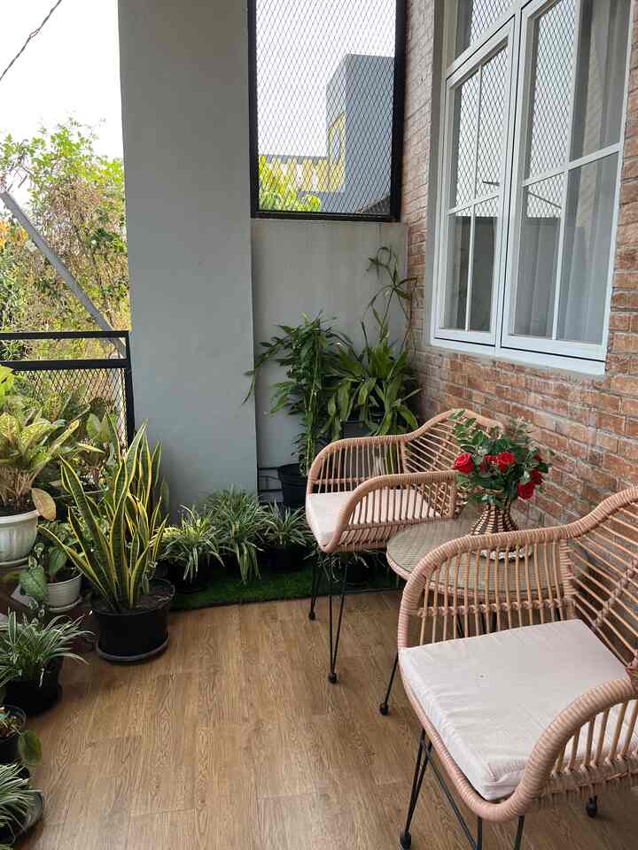 Balcony area on the 2nd floor. There is a set of tables and chairs made of rattan for just sitting and relaxing while spending time.

#balcony #outdoor #tamanbalkon #ruangterbuka #tamankecil #kursiteras #rumahminimalis