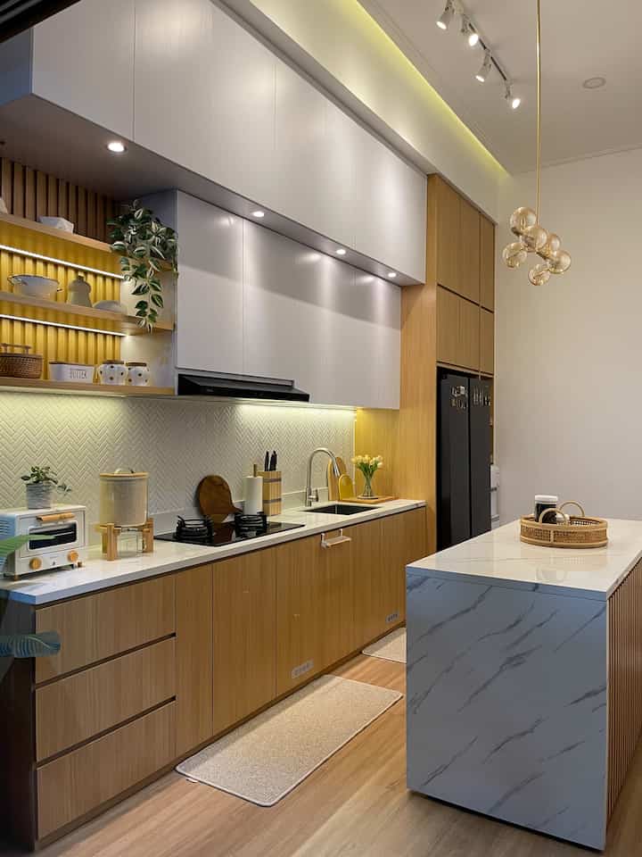 Favorite Room

This kitchen is our favorite room in our house. Comfort and aesthetics are the reasons why you really feel at home in this kitchen.
Especially if the kitchen is clean and tidy.
My favorite time in the kitchen is usually when cooking and eating with the family.

My favorite things in this kitchen are the hanging lamp, kitchen island and fake plant pot cover. The hanging lamp gives an elegant impression. The addition of a multifunctional kitchen island and bamboo pot covers give a natural impression.


#MyFavoriteRoom #MyHouseStory #MyFavoriteItems #kitchengoals #KitchenDesign #KitchenIdeas