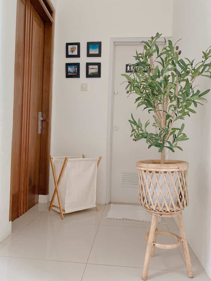 Corridor leads to bedroom and guest bathroom.
#laundrybag #oliveleaf #painting #toilet #bandung #homedecorinspo #aestheticdecor