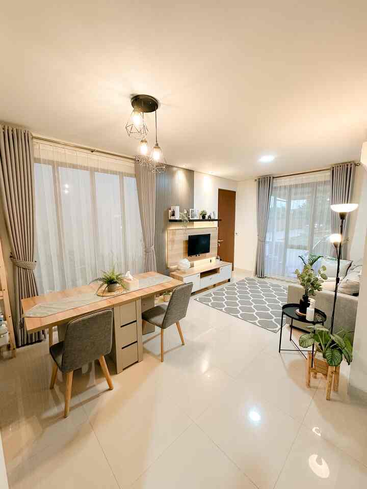 Natural wood tone and light gray compact dining and living room for two people with modern furniture