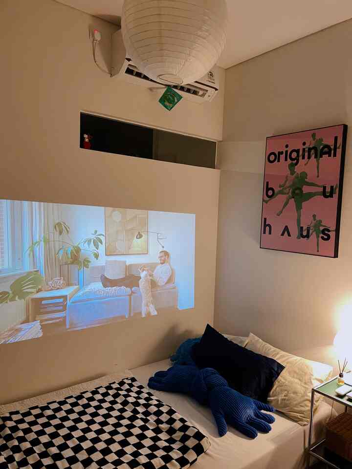 Some photos from the bedroom, although small but super comfy! 🛏️✨

BTW, for friends who have limited bedroom space, using a projector 📽️ can be a solution to save space. The screen size can be adjusted, the resolution is 1080p, it supports Android OS, and there are speakers too. I myself use the Wanbo T2 Max brand. This is more than enough for streaming YouTube, Netflix, or listening to Spotify playlists! 🎵

#bedroom
#bedroomideas
#bedroominspo
#midcenturymodern
#retro
#projector
#bedroom