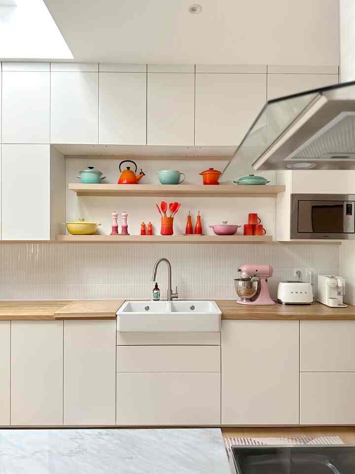 BTNOA Season 3
The kitchen - the highlight of our renovation project. Finally our renovation project was finished, one of our major renovations was the kitchen expansion. What was originally a kitchen length of 2.5m became 6m. And to increase lighting in the kitchen, we added a skylight. The presence of a skylight really changes the vibe of this room. My kitchen has always been white, because I think white things are easier to clean than colored ones. Then I also chose a kitchen set that is up to the ceiling so there are lots of storage places.

#themostinspiringkitchen
#inspochallenge
#kitchen
#lecreuset
#whitekitchen
#aesthetic
#homestylingbyrina
#homedecorbyrina
#arieskamarina
#ikea