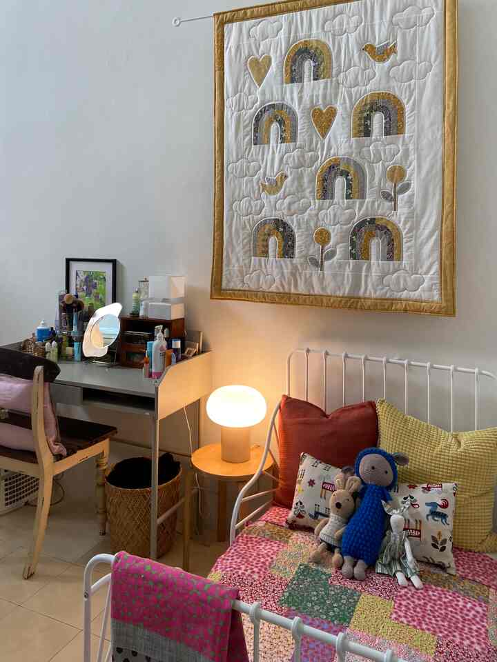 Our 3yr old Daughter’s Bedroom. We love this adjustable bed from IKEA that can grow with her. She adores colors, so we try to layer a couple pattern from her blanket and pillow to keep it playful 🌈 

Her grandma also sew a quilted blanket when she was born, and we hung it on top of her headboard. 

#DekorasiKamarAnak
#InspirasiKamarAnak
#KidsRoonStyling
#smallspace
#smallhouse
