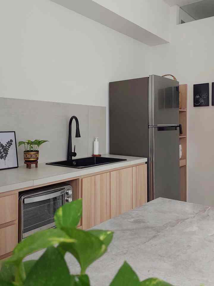 As the heart of our house, and because it uses an open floor concept, we try to make sure this kitchen always looks neat.

To achieve that, all items that are kitchen equipment must have a home, including electronics in the kitchen.

This kitchen is 3.8m long and the kitchen island is 120cm long to support cooking activities.

We prefer a clean and minimalist look so that additional decorations don't show up too much. We rotate only a few plants regularly so that the room always looks fresh.


#kitchenstyling #kitchendecorideas #kitchenmakeover #scandinavian #minimalist #openfloorplan