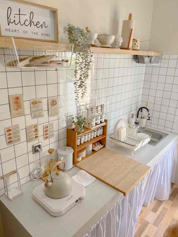 Starting from liking watching Korean dramas, seeing how beautiful the kitchen is, I finally became inspired to make this small kitchen by looking for inspiration on Pinterest and Instagram..
And... this simple kitchen was created🥰
“Korean-style Aesthetic Kitchen” which is very popular lately. The appearance is simple but still beautiful, elegant, with soft colors such as white/ivory, or pastel, as well as wooden elements and lighting that make the atmosphere feel warm and comfortable.

Hopefully it can be an inspiration for those of you who are still confused about what kind of kitchen renovation to do🤍🌷


#rumahwithoutarchitect #selfmakeover #DIY #minimalist #rumahcluster #kalteng #decorlowbudget