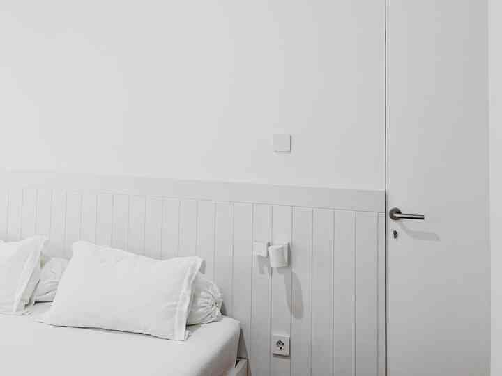 The master bedroom is our favorite room after the kitchen. The master bedroom is a favorite area when my husband, children and I exchange stories before we sleep.

There is nothing special about the decoration of our main bedroom, we deliberately made this room clean and without many items so that we could sleep soundly without any distractions. But the head bed/wall panel is the point of interest in this bedroom, because the white color matches the wall and door paint, which is very suitable for adding an aesthetic element to the bedroom.

This bedroom does not have air conditioning, alternatively we have a large window circulation opening 2x1.5 meters which allows light and cool air circulation to enter our bedroom.

#myfavoriteroom #myhousestory #myfavoriteitems #bedroom #whitedecor


