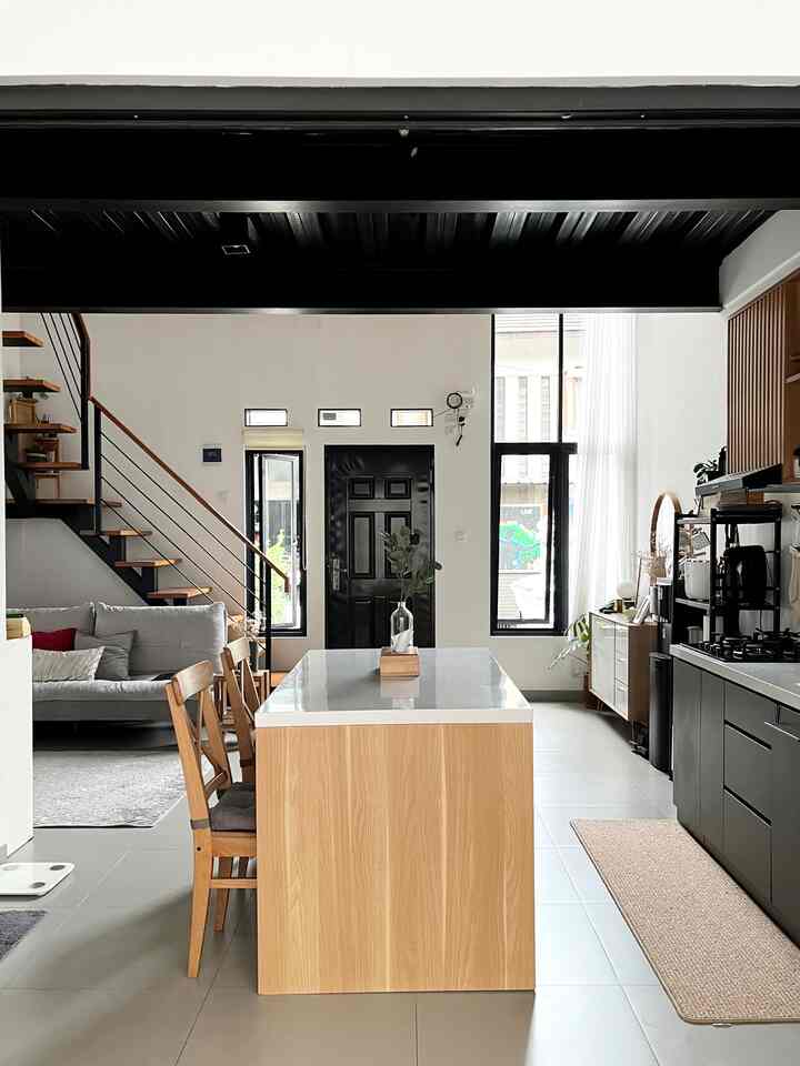 Japandi Industrial on limited land

At first we liked the industrial style. We like the masculine appearance of the design and also seem timeless. But we didn't want a style that was too stiff and cold. We wanted to maintain a warm element so we combined an industrial style with wooden accents and white. Finally, we called our house style Japandi Industrial.

The industrial accent in our home can be seen from:
1. Void chandelier
2. Floating staircase design
3. Bondex ceiling above the kitchen
4. Black furniture, equipment and decorations
5. Granite Tiles are light gray in color.

Meanwhile, the Japanese accent can be seen from:
1. Mezzanine grille made of solid wood
2. Stair steps made of solid wood
3. Natural wood colored kitchen set with grille accents
4. White & wood colored furniture.
5. Natural wood colored decoration.

Hope it inspires

#JapandiIndustrial #Japandi #Industrial #homedecorinspo #aesthetichomedecor