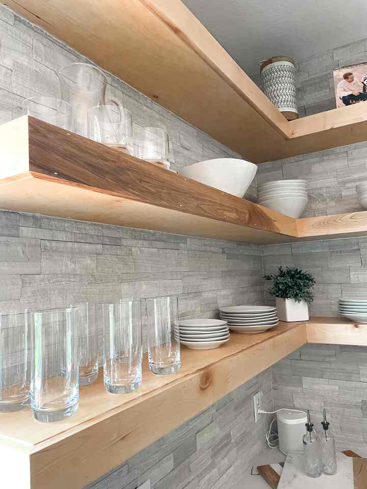 Loving the open shelf concept #openkitchen #kitchenwithoutuppercabinets 