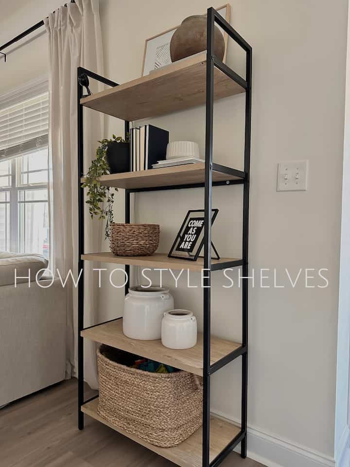 Styling shelves is an art form 😅 my advice is to pick a color palette, and stick to it. Repeat the colors throughout spaced evenly. Don’t go overboard with little trinkets and choose items to scale. Add lots of books, and some functional storage throughout. Happy styling!
#shelfstyling #shelfinspo #neutralaesthetic