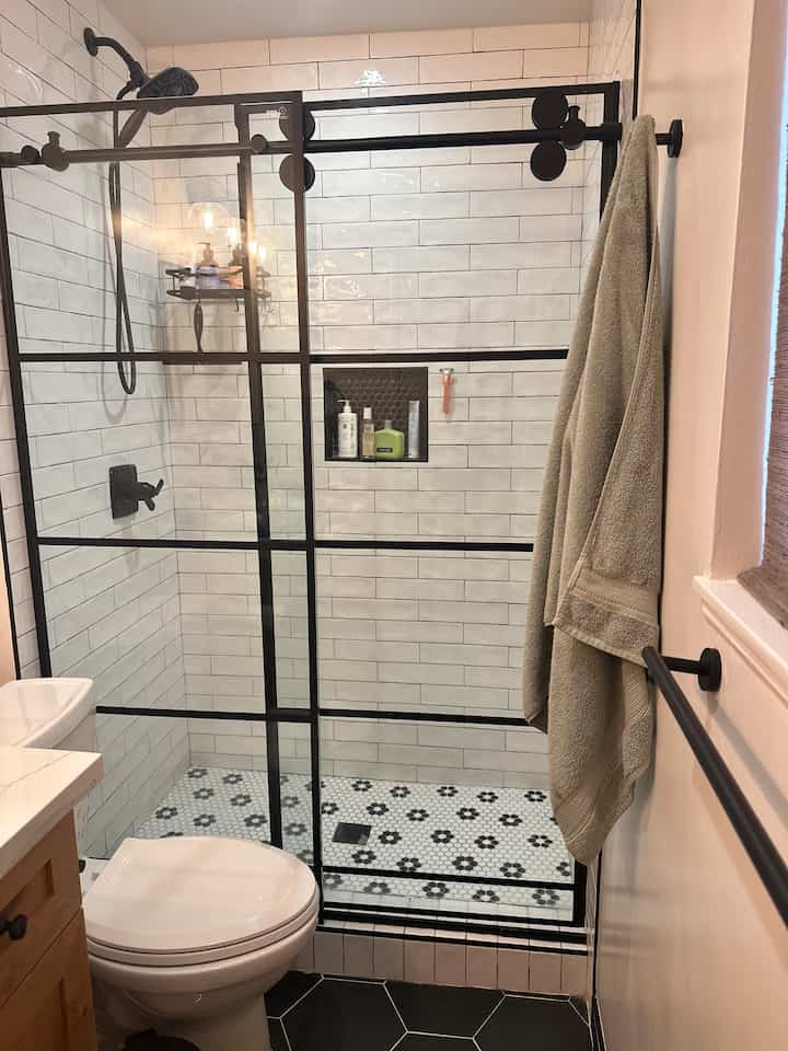 #shower #blackandwhite #blackandwhiteinterior  #pennytile #glassshower #bathroom